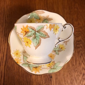 Vintage E B Foley China Pre Shelley Teacup and Saucer featuring Hand Painted Yellow Flowers