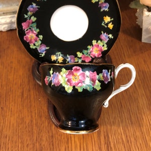Paragon Corset Black China Teacup and Saucer With Pink Roses and Wild Flowers Band