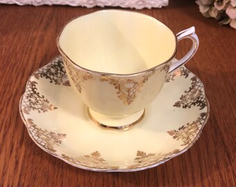 Royal Albert Yellow Teacup and Saucer: Gold Filigree China