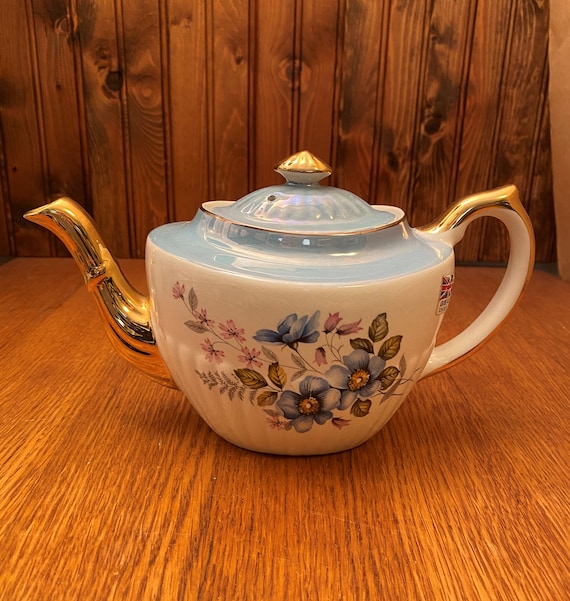 Gibsons England Irridescent Blue Top With Blue Floral