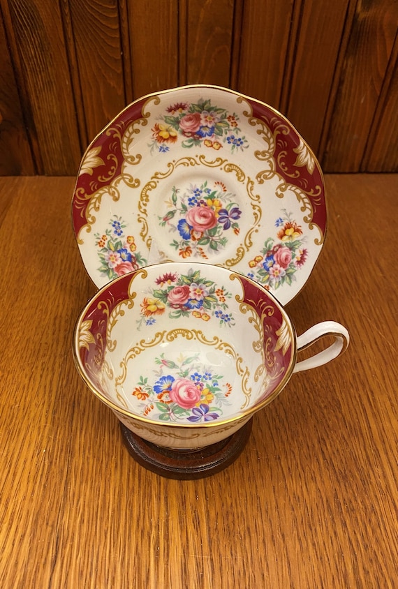 Metropolitan Tea Burgundy Ceramic Teacup and Saucer Set