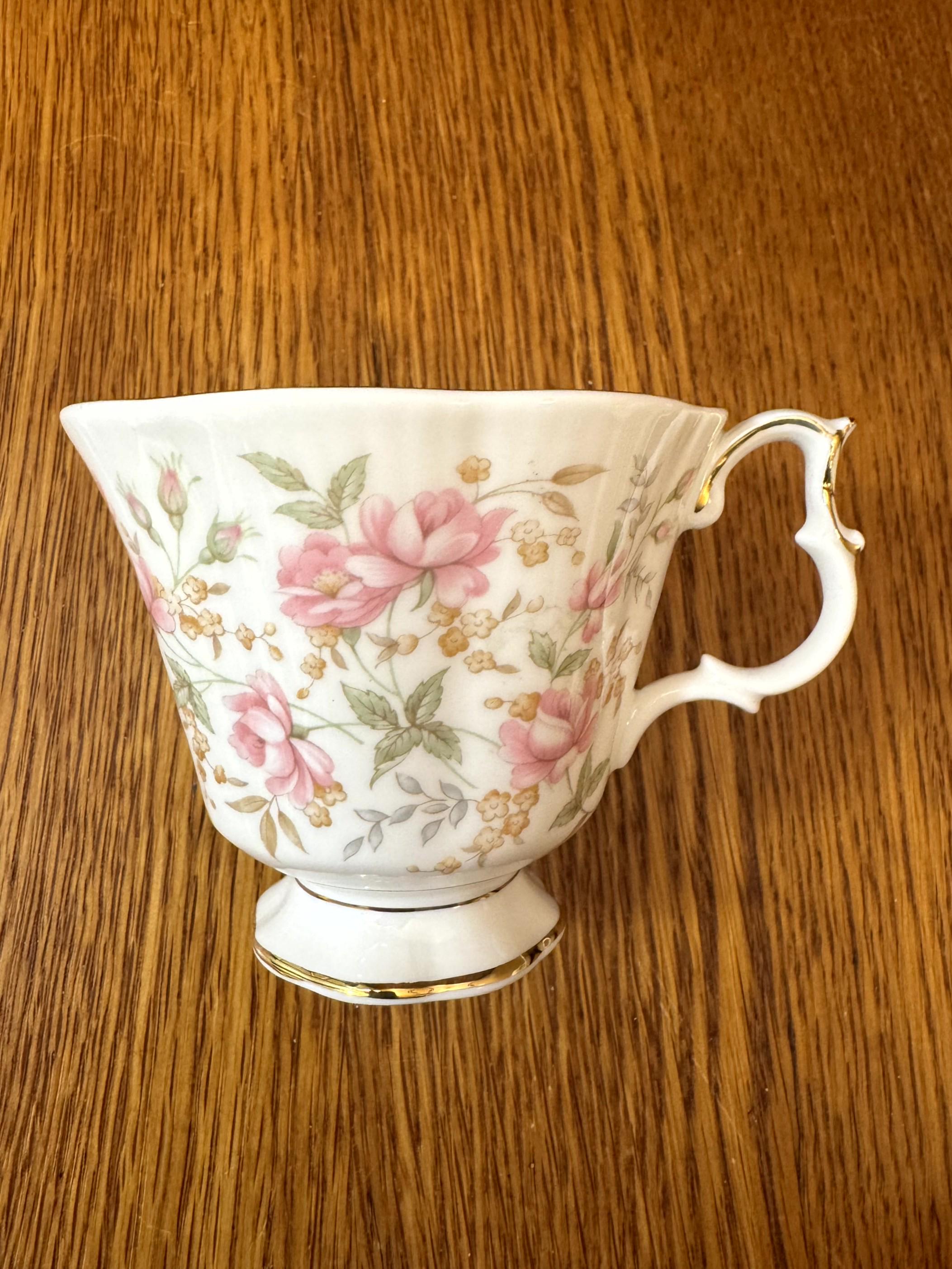Royal Albert Pink Brocade Teacup and Saucer: Rose Chintz Series