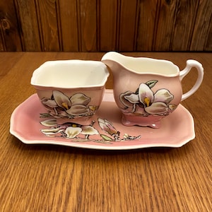 Royal Winton Grimwades Hand Painted Magnolia&#39;s Cream, Sugar and Tray on a Pink Background