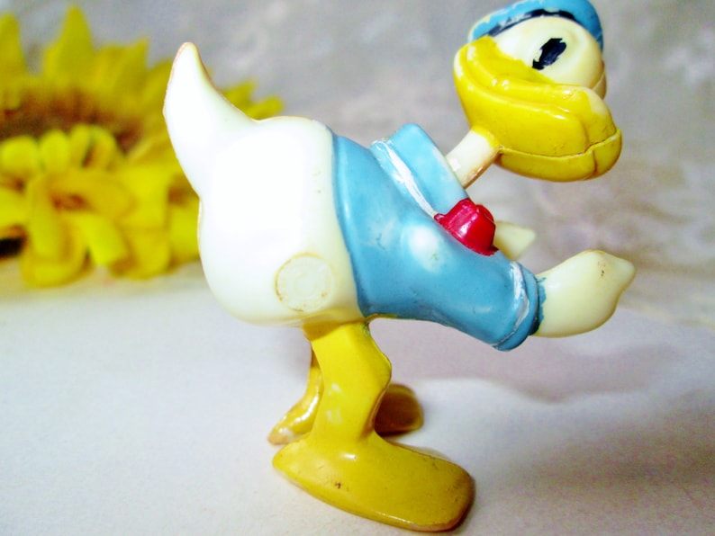 Kid Rocking Duck Bobblehead - Childhood Toy Figurine
