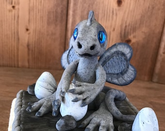 Dragon Gargoyle with Heart Wings Babysitting His Sibling Dinosaur Eggs - Polymer Clay in Granite Stone Marble Look on Clay Covered Wood Base