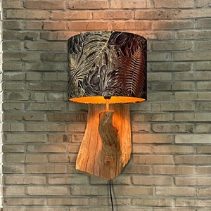 Bring nature into your home with this beautiful wall lamp