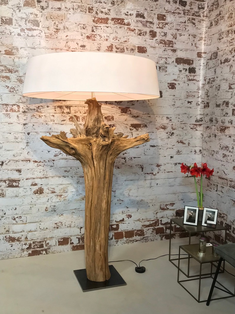 Floor lamp of weathered old tree stump.
