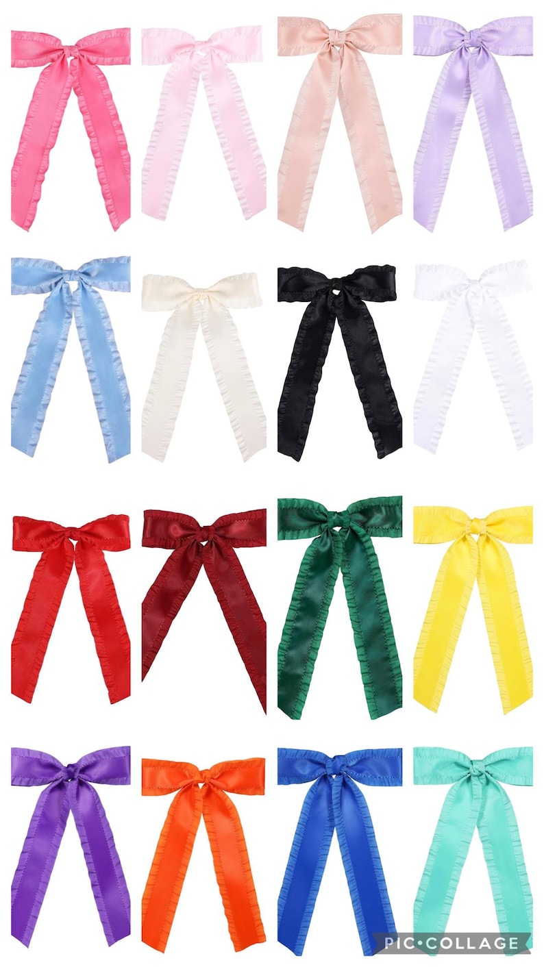 May include: A set of 12 hair bows in various colors, including pink, light blue, white, black, red, green, yellow, purple, orange, and blue. Each bow has a ruffled edge and is made of satin.