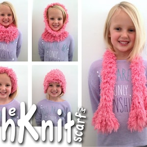 May include: A pink fuzzy scarf with a girl wearing a purple shirt with the text "You are my only sunshine" on it. The scarf can be worn as a cowl neck or a long scarf.