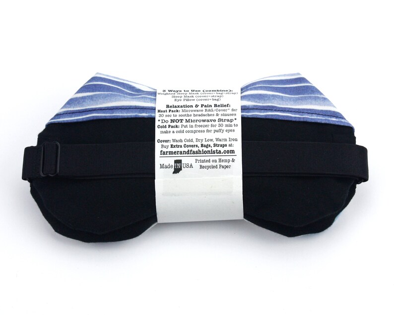 Puede incluir: Una m&aacute;scara para dormir de rayas azules y blancas con una correa ajustable negra. La parte posterior de la m&aacute;scara tiene instrucciones para usar la m&aacute;scara como una compresa caliente o fr&iacute;a. El texto dice "Relaxation & Pain Relief", "Heat Pack: Microwave BAG/Cover for 30 sec to soothe headaches & sinuses", "Do NOT Microwave Strap", "Cold Pack: Put in freezer for 30 min to make a cold compress for puffy eyes", "Cover: Wash Cold. Dry Low, Warm Iron", "Buy Extra Covers, Bags, Straps at farmerandfashionista.com", "Printed on Hemp & Recycled Paper", "Made in USA".