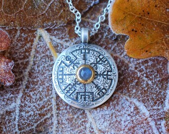 Platinum plated silver Vegvísir or Viking compass pendant with a gemstone quality feldspar in a gold vermeil setting on a solid silver chain