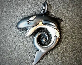 Orca necklace, killer whale necklace, silver koru pendant, blackened silver sea mammal jewelry with polished details. © Argent Aqua