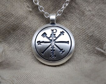 Satin finished Canterbury Amulet. Solid sterling silver St. Columbanus's seal for protection against evil on a silver chain. © Argent Aqua