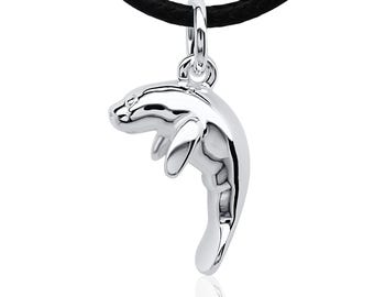 Manatee charm necklace. Made from highly polished, tarnish resistant silver, strung on a strong cord. © Argent Aqua