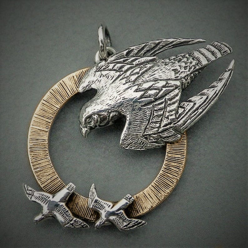 bird of prey animal totem jewelry as seen on TV. Peregrine Falcon necklace solid gold and silver raptor pendant