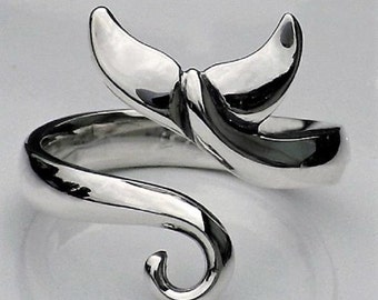 Whale tail ring, silver torque ring, whale fluke ring. UK finger size M, US finger size 6, slightly adjustable size. © Argent Aqua