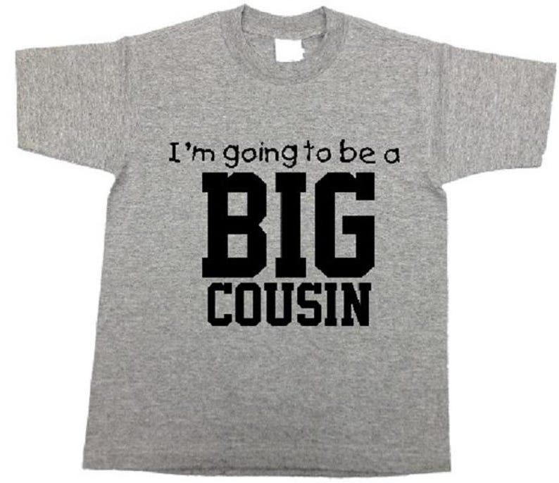 May include: Gray t-shirt with black text that reads "I'm going to be a BIG COUSIN".