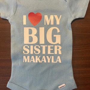 Personalized sister baby onesie ® - custom infant older sibling gift - one piece bodysuit - girl name shower gift