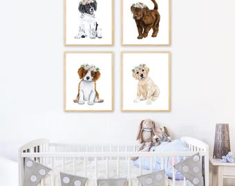 May include: Four framed watercolor prints featuring puppies wearing floral crowns. The top left shows a black and white puppy, the top right a brown puppy, the bottom left a brown and white puppy, and the bottom right a cream-colored puppy.