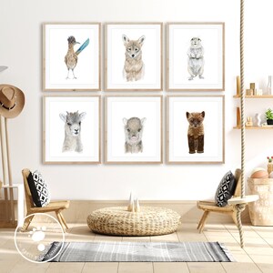 May include: Set of six watercolor animal illustrations in white frames. The illustrations feature a roadrunner, a coyote pup, a prairie dog, a bighorn sheep, a peccary, and a fisher.