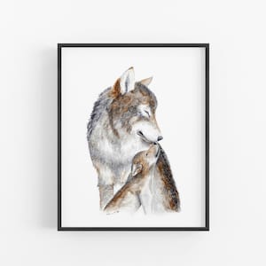 A framed painting depicting a mother wolf and her cub, with the mother's head and body in the foreground and the cub's body in the background.