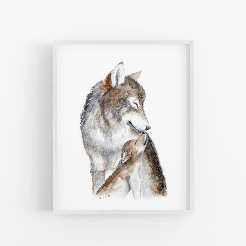A framed watercolor painting depicting a mother wolf and her cub.