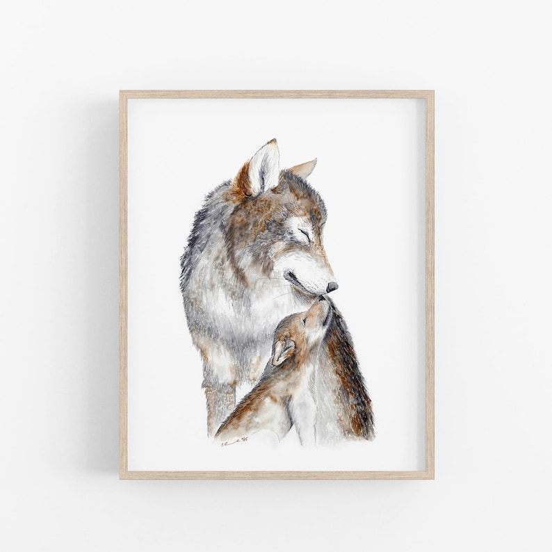 A framed watercolor painting depicting a mother wolf and her cub.