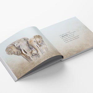 May include: A watercolor illustration of a family of elephants. The mother elephant is standing with her two calves. The text on the page reads: "I was always there for you, no matter what life can be like. This moment which pulls you together, our support will meet you back. Although one day you may go roam, remember we'll always be your home. And love is deep in your heart."