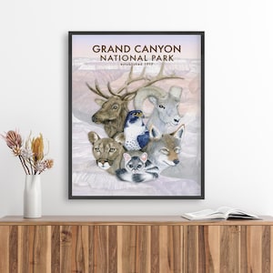 The image is a framed poster of various animals, including a deer, a bird, a wolf, and a cat, set against a pale pink background.