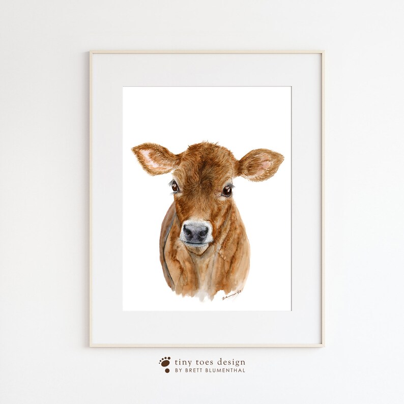a picture of a brown cow with a white background