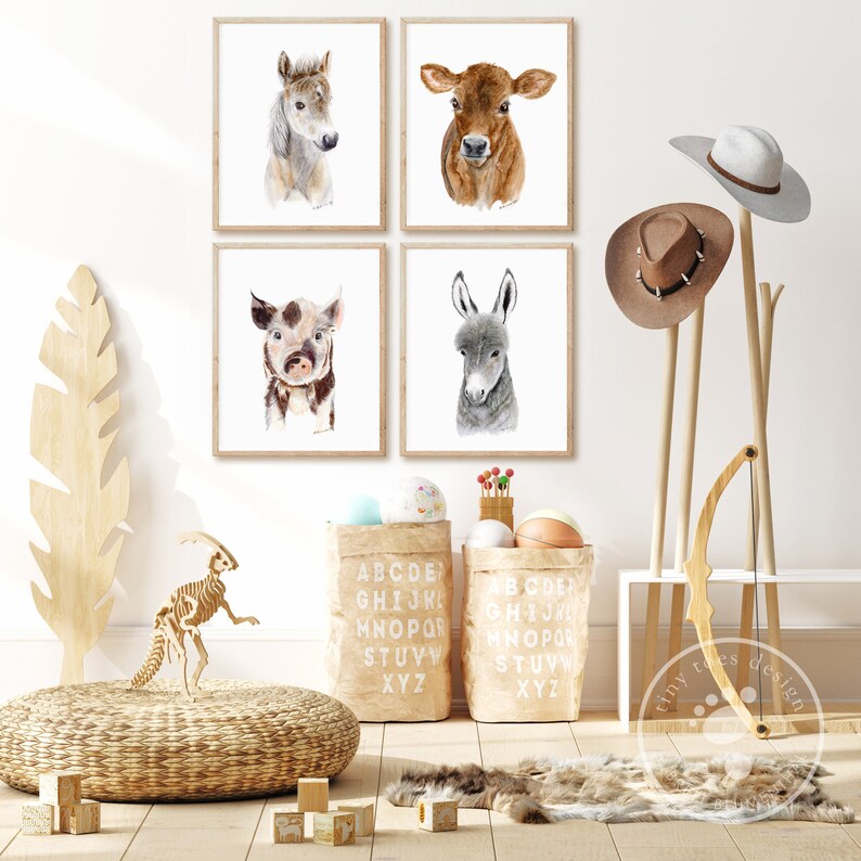 a set of four animal prints on a wall