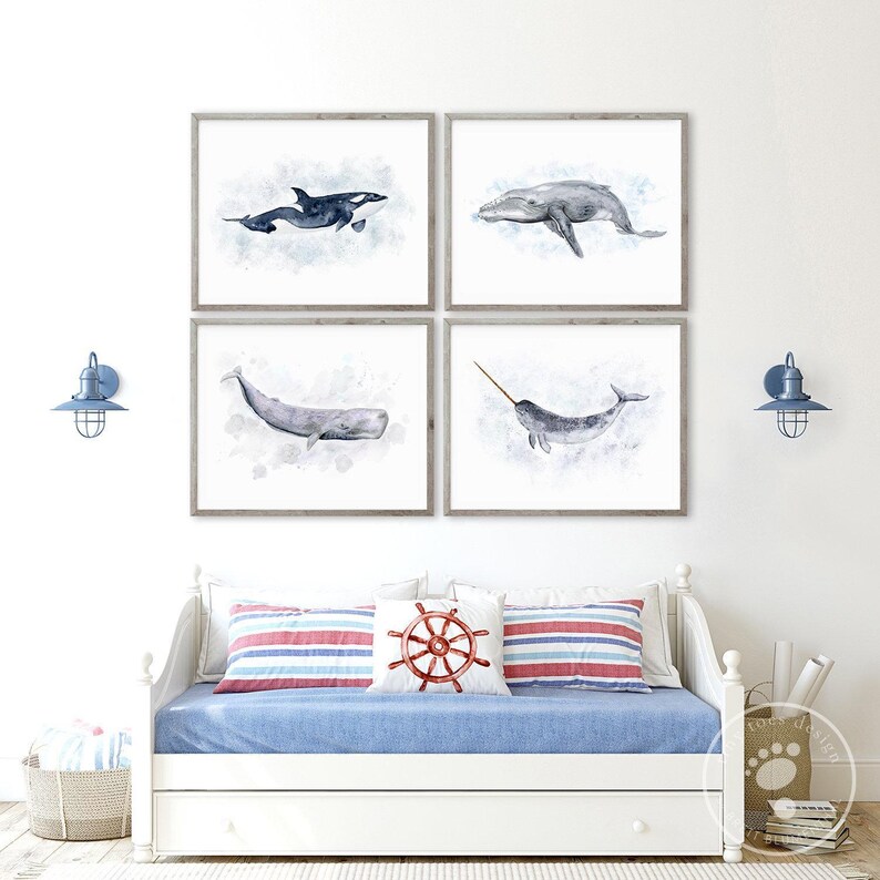 a bedroom with a bed and four pictures on the wall