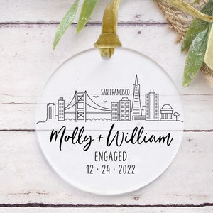 Personalized city skyline for engaged couple's first Christmas ornament, Clear acrylic with velvet ribbon, Handmade heirloom Christmas gift