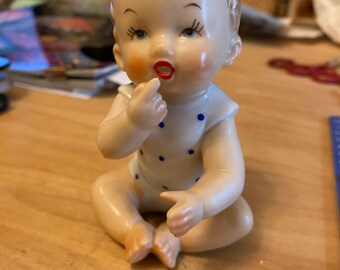 Vintage Porcelain Piano Baby