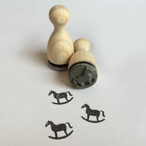 Cheval à bascule tampon encreur