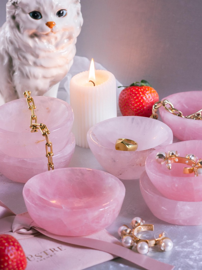 Natural rose quartz trinket dish with polished finish, ideal for crystal lovers or as a Valentine’s Day gift.