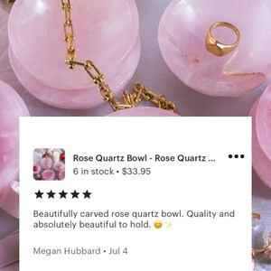 Stone trinket dish for jewelry made of prink rose quartz crystal.