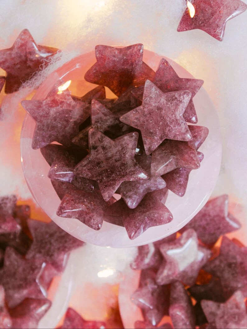 Set of strawberry quartz stars in rosy hues, perfect for collectors or energy work — these shimmering crystals promote love, balance, and gentle positive energy.