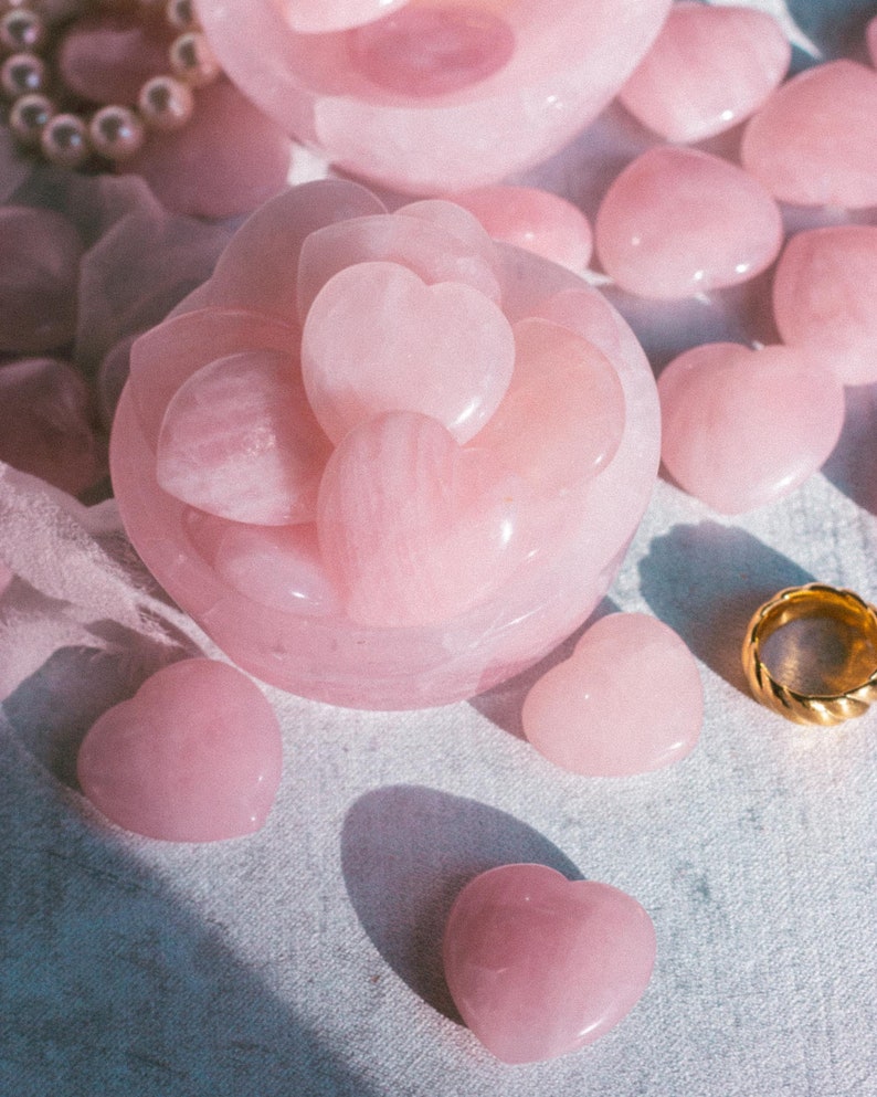 Rose quartz heart worry stone, naturally polished and hand-carved, ideal for self-love, stress relief, and crystal healing.