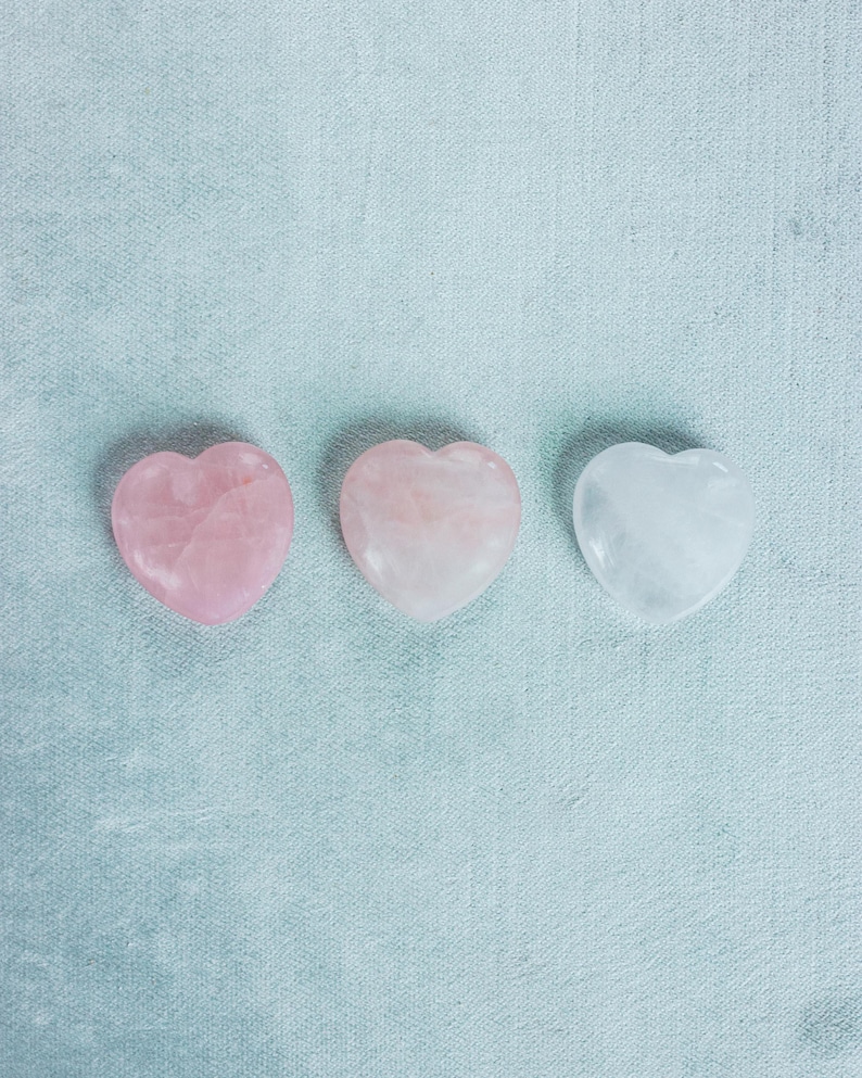 Hand-polished rose quartz heart, ideal as a palm stone for mindfulness, self-care, or crystal collections.