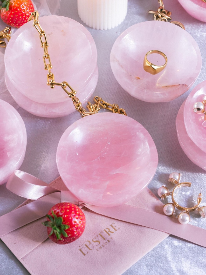 Pink rose quartz trinket dish, hand-carved for a stylish and romantic addition to any vanity or dresser.