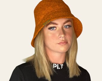 Orange colour bucket hat with wide brim, unisex headwear, edgy gift, fall and winter head accessories.