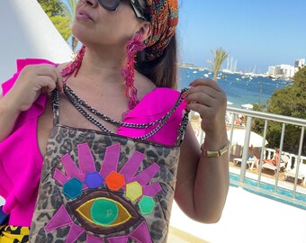 Leopard Shoulder Bag, with Pink Eye Design, inside pocket, and magnetic clasp for closure.