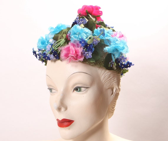 1950s 1960s Multi-Colored Bright Blue, Pink and Purple Floral Faux Flower Covered Formal Hat by Montaldo’s