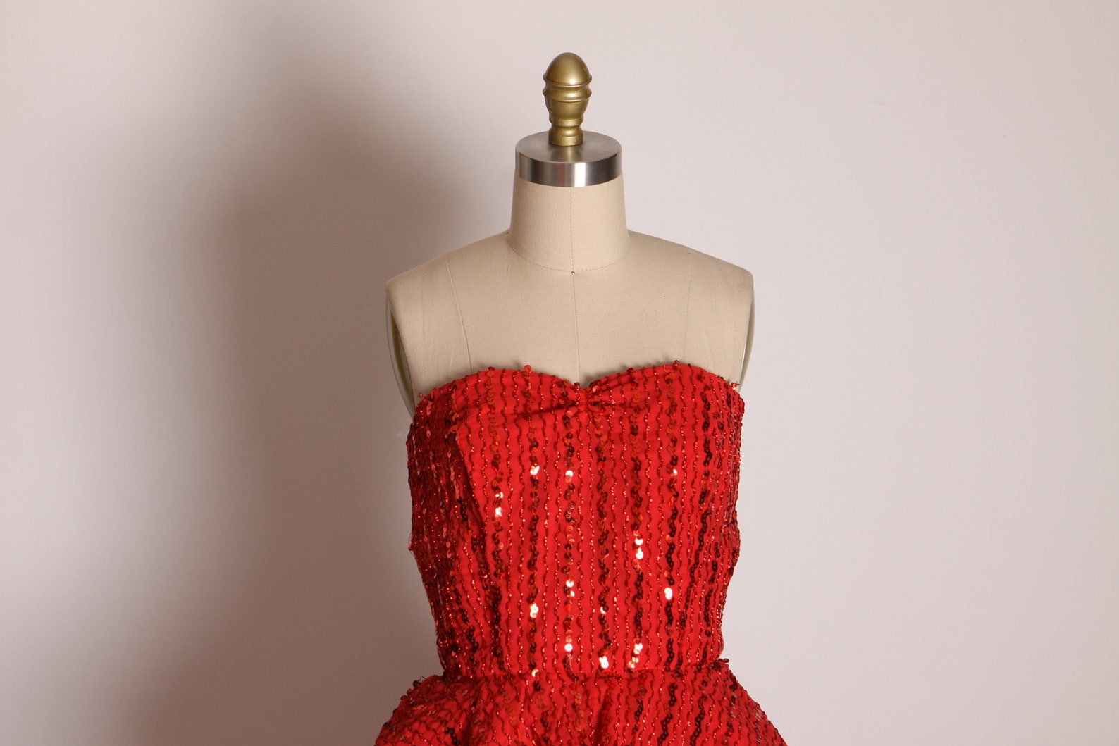 red sequin strapless gown