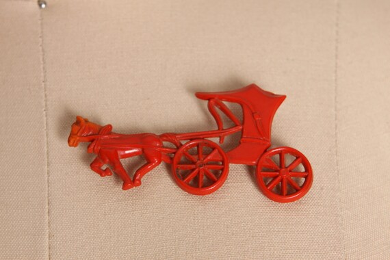 1940s Red Celluloid Horse and Carriage Novelty Pin