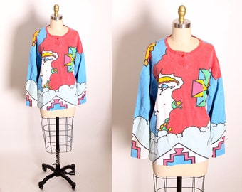 1980s 1988 Novelty Multi-Colored Woman’s Face Bedazzled Rhinestone 3/4 Length Sleeve 1960s Style Peter Max All Over Print Blouse by Neomax
