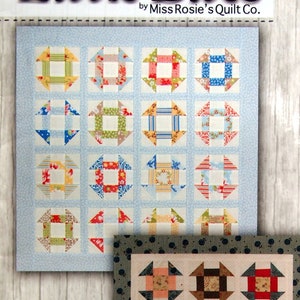 May include: Two quilt patterns are displayed. The top quilt has a light blue background with colorful square blocks. The bottom quilt has a cream background with square blocks and a green border. The text "Little Bites" and "Jot" are visible.