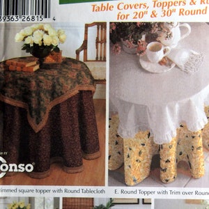 May include: A sewing pattern for table covers, toppers, and runners for 20" and 30" round tables. The pattern includes five different designs, featuring fringe trim, gathered skirts, and lace edging. Simplicity 5467 Easy! Table Covers.