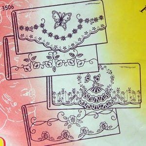 May include: Vintage Aunt Martha's Hot Iron Transfers for crewel work. The cover features four pillow slip designs with floral and butterfly motifs. The text reads "Each design good for up to six or more stampings."